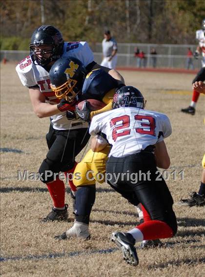 Thumbnail 3 in Triad @ Marion (IHSA Class 5A Playoffs - First Round) photogallery.