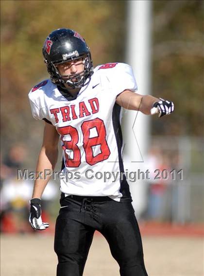 Thumbnail 2 in Triad @ Marion (IHSA Class 5A Playoffs - First Round) photogallery.