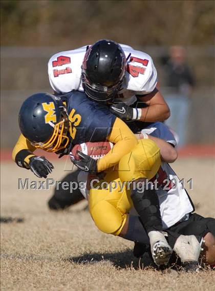 Thumbnail 3 in Triad @ Marion (IHSA Class 5A Playoffs - First Round) photogallery.