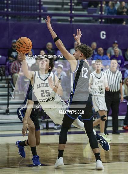 Thumbnail 1 in Quincy vs. Althoff Catholic (Prairie Farma Holiday Classic) photogallery.