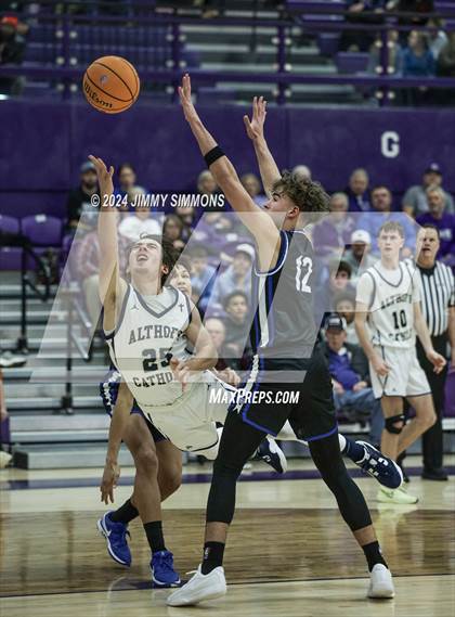 Thumbnail 3 in Quincy vs. Althoff Catholic (Prairie Farma Holiday Classic) photogallery.