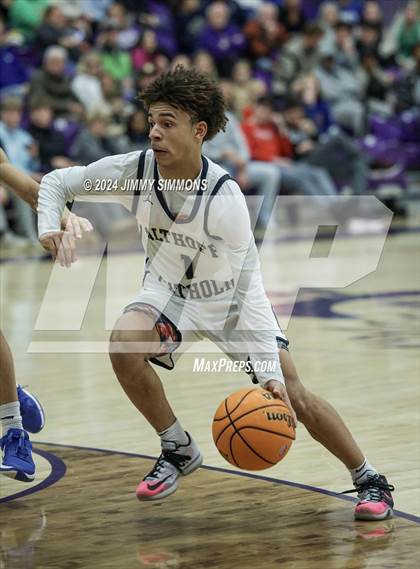 Thumbnail 1 in Quincy vs. Althoff Catholic (Prairie Farma Holiday Classic) photogallery.