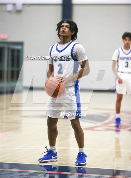 Thumbnail 2 in Grand Prairie vs. Rowlett (Denton Ryan Holiday Showcase) photogallery.