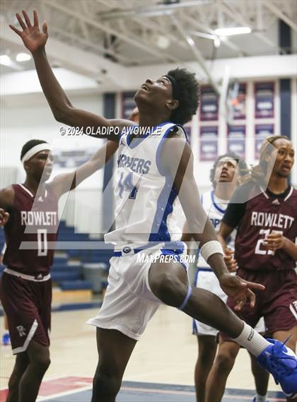 Thumbnail 2 in Grand Prairie vs. Rowlett (Denton Ryan Holiday Showcase) photogallery.