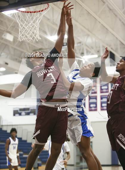 Thumbnail 3 in Grand Prairie vs. Rowlett (Denton Ryan Holiday Showcase) photogallery.