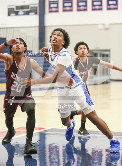 Thumbnail 1 in Grand Prairie vs. Rowlett (Denton Ryan Holiday Showcase) photogallery.