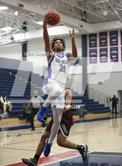 Thumbnail 1 in Grand Prairie vs. Rowlett (Denton Ryan Holiday Showcase) photogallery.