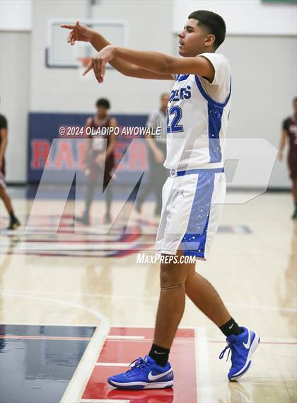 Thumbnail 1 in Grand Prairie vs. Rowlett (Denton Ryan Holiday Showcase) photogallery.