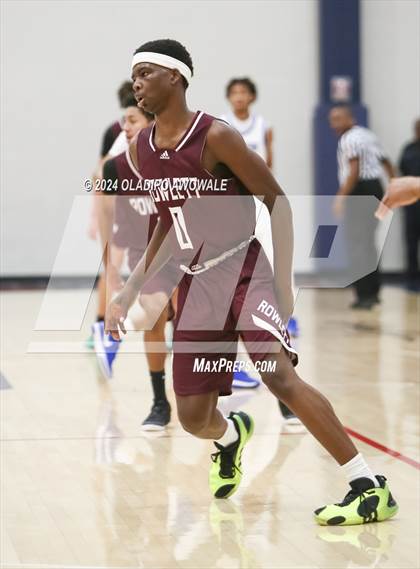 Thumbnail 1 in Grand Prairie vs. Rowlett (Denton Ryan Holiday Showcase) photogallery.