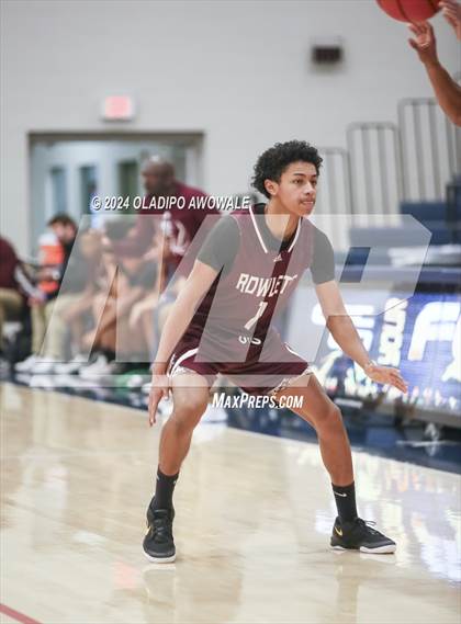 Thumbnail 2 in Grand Prairie vs. Rowlett (Denton Ryan Holiday Showcase) photogallery.