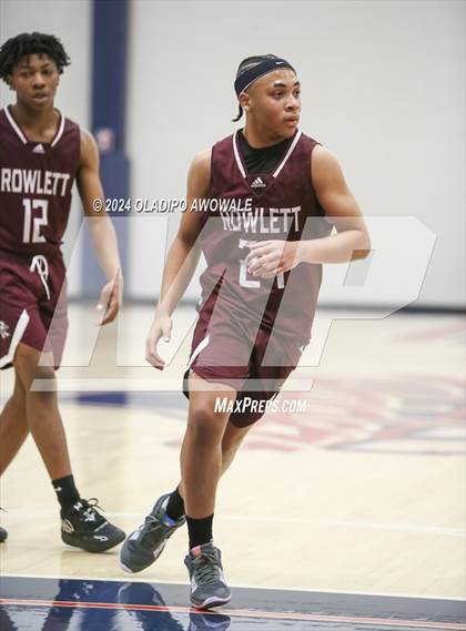 Thumbnail 2 in Grand Prairie vs. Rowlett (Denton Ryan Holiday Showcase) photogallery.