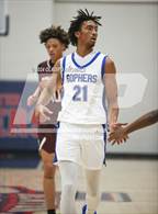 Photo from the gallery "Grand Prairie vs. Rowlett (Denton Ryan Holiday Showcase)"