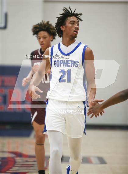 Thumbnail 2 in Grand Prairie vs. Rowlett (Denton Ryan Holiday Showcase) photogallery.