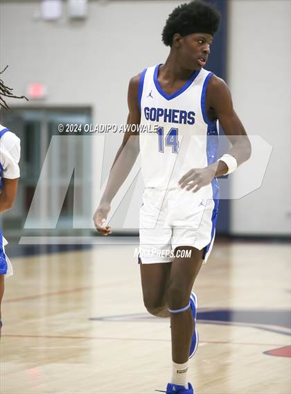 Thumbnail 3 in Grand Prairie vs. Rowlett (Denton Ryan Holiday Showcase) photogallery.