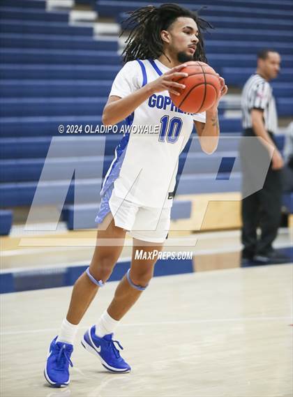 Thumbnail 3 in Grand Prairie vs. Rowlett (Denton Ryan Holiday Showcase) photogallery.