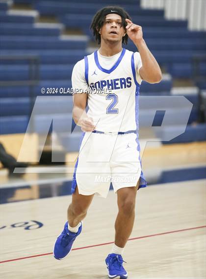 Thumbnail 2 in Grand Prairie vs. Rowlett (Denton Ryan Holiday Showcase) photogallery.