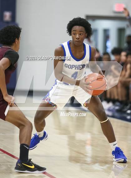 Thumbnail 2 in Grand Prairie vs. Rowlett (Denton Ryan Holiday Showcase) photogallery.