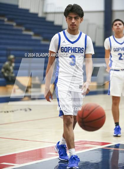 Thumbnail 3 in Grand Prairie vs. Rowlett (Denton Ryan Holiday Showcase) photogallery.