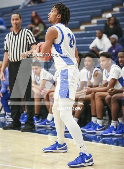 Thumbnail 3 in Grand Prairie vs. Rowlett (Denton Ryan Holiday Showcase) photogallery.