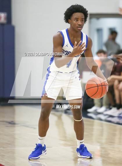 Thumbnail 3 in Grand Prairie vs. Rowlett (Denton Ryan Holiday Showcase) photogallery.