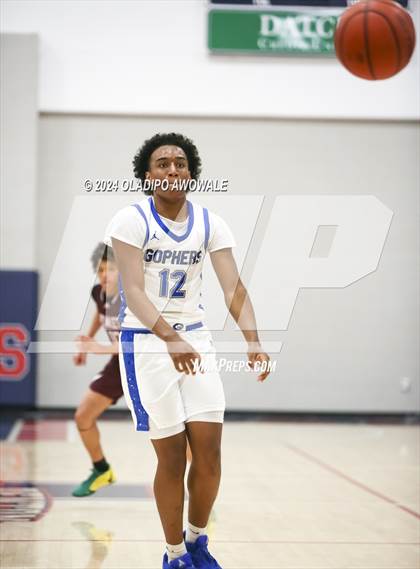 Thumbnail 3 in Grand Prairie vs. Rowlett (Denton Ryan Holiday Showcase) photogallery.