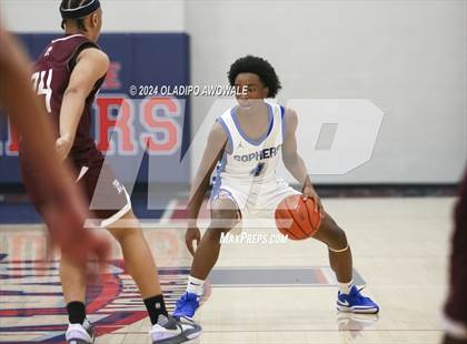 Thumbnail 3 in Grand Prairie vs. Rowlett (Denton Ryan Holiday Showcase) photogallery.