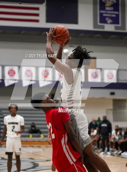 Thumbnail 1 in Hammond vs. Fort Wayne North Side (Sneakers for Santa Shootout) photogallery.