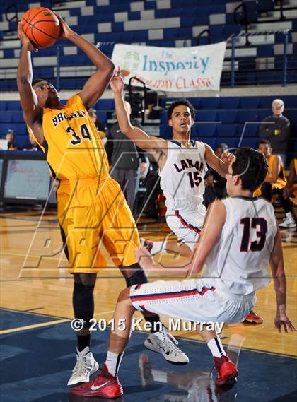 Thumbnail 1 in Lamar vs Brennan (Insperity Holiday Classic) photogallery.
