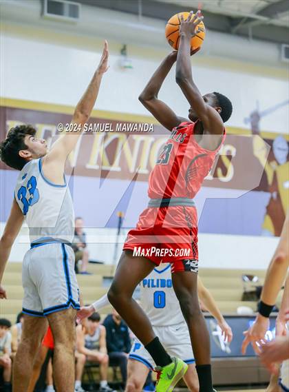 Thumbnail 2 in Oak Hills vs Pilibos (St. Francis Holiday Hoopfest Tournament) photogallery.