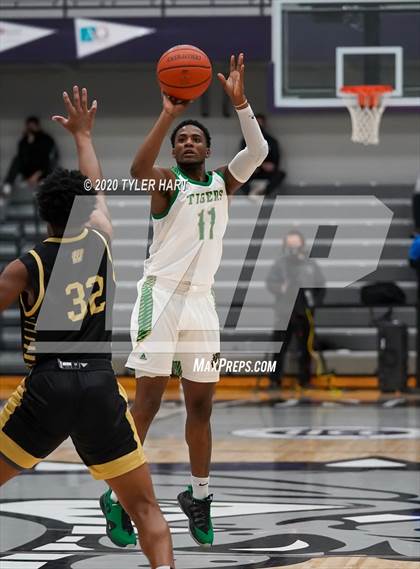 Thumbnail 2 in Indianapolis Crispus Attucks vs. Warren Central (Sneakers for Santa Shootout) photogallery.
