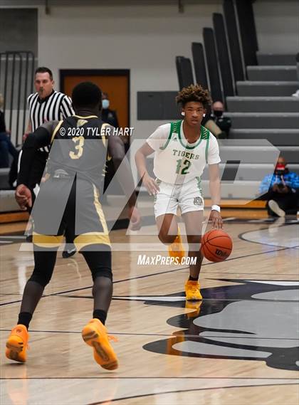 Thumbnail 1 in Indianapolis Crispus Attucks vs. Warren Central (Sneakers for Santa Shootout) photogallery.