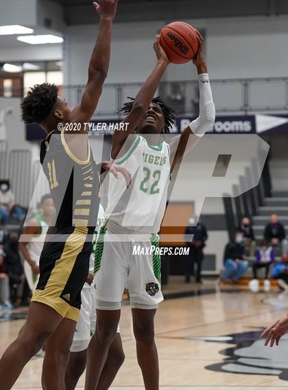 Thumbnail 1 in Indianapolis Crispus Attucks vs. Warren Central (Sneakers for Santa Shootout) photogallery.