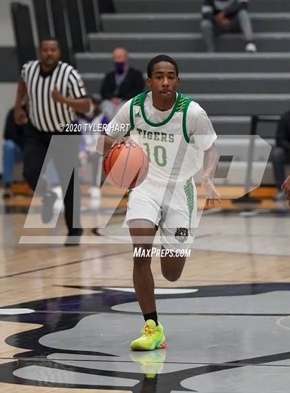 Thumbnail 1 in Indianapolis Crispus Attucks vs. Warren Central (Sneakers for Santa Shootout) photogallery.