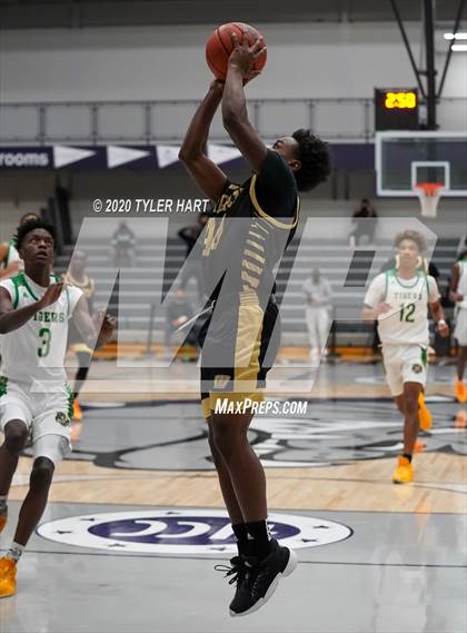 Thumbnail 3 in Indianapolis Crispus Attucks vs. Warren Central (Sneakers for Santa Shootout) photogallery.
