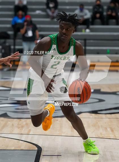 Thumbnail 3 in Indianapolis Crispus Attucks vs. Warren Central (Sneakers for Santa Shootout) photogallery.