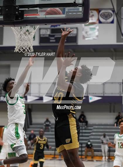 Thumbnail 1 in Indianapolis Crispus Attucks vs. Warren Central (Sneakers for Santa Shootout) photogallery.