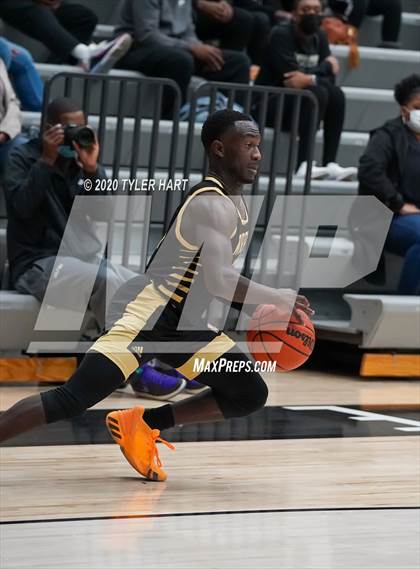 Thumbnail 2 in Indianapolis Crispus Attucks vs. Warren Central (Sneakers for Santa Shootout) photogallery.