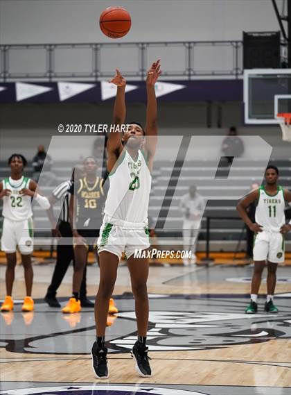 Thumbnail 1 in Indianapolis Crispus Attucks vs. Warren Central (Sneakers for Santa Shootout) photogallery.