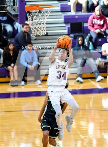 Thumbnail 1 in Ravencroft vs Broughton (John Wall Holiday Invitational) photogallery.