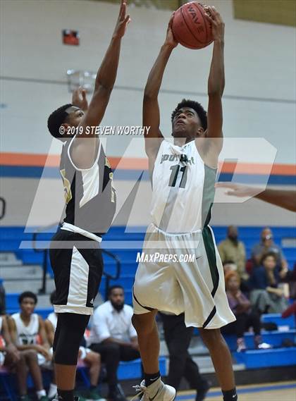 Thumbnail 1 in Knightdale vs Southeast Raleigh (Athens Drive JV Holiday Tournament) photogallery.