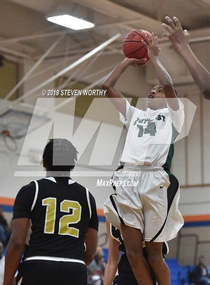 Thumbnail 2 in Knightdale vs Southeast Raleigh (Athens Drive JV Holiday Tournament) photogallery.