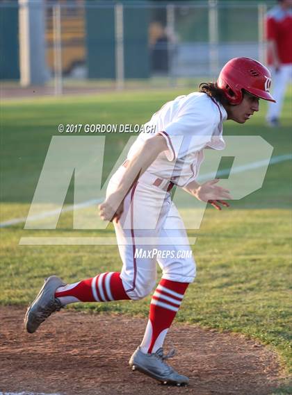 Thumbnail 1 in Centennial vs. Wilson (UIL 5A Bi-District Playoff) photogallery.