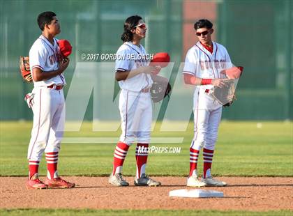 Thumbnail 1 in Centennial vs. Wilson (UIL 5A Bi-District Playoff) photogallery.