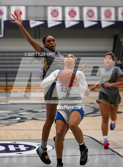 Thumbnail 3 in Reynoldsburg vs. Franklin Community (Sneakers for Santa Shootout) photogallery.