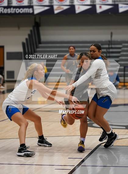 Thumbnail 3 in Reynoldsburg vs. Franklin Community (Sneakers for Santa Shootout) photogallery.