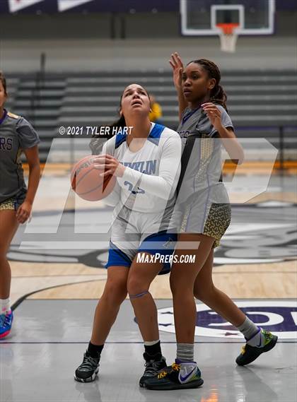 Thumbnail 1 in Reynoldsburg vs. Franklin Community (Sneakers for Santa Shootout) photogallery.