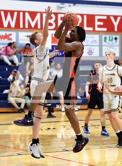 Thumbnail 3 in Medina Valley vs. Stephenville (Wimberley Hoopfest) photogallery.