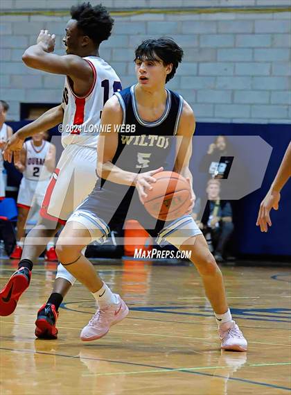 Thumbnail 1 in St. John The Baptist vs Wilton (New York Holiday Invitational) photogallery.