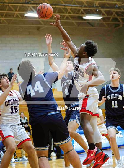Thumbnail 3 in St. John The Baptist vs Wilton (New York Holiday Invitational) photogallery.