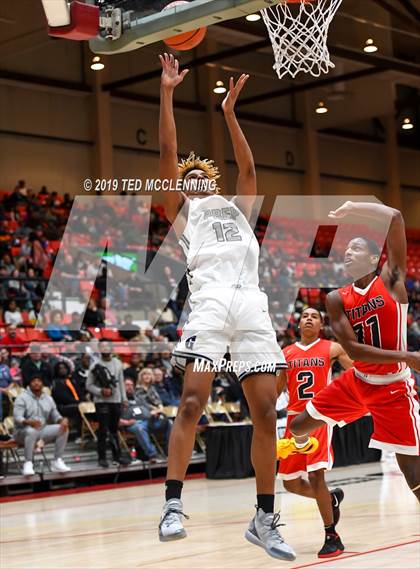 Thumbnail 2 in Jacksonville  vs. Gulliver Prep (King Cotton Classic) photogallery.